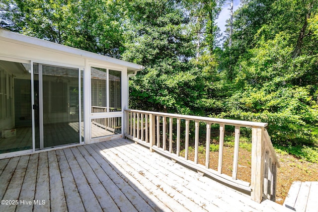 103 Arborvitae Ct, Pine Knoll Shores, NC 28512 - deck with a sunroom