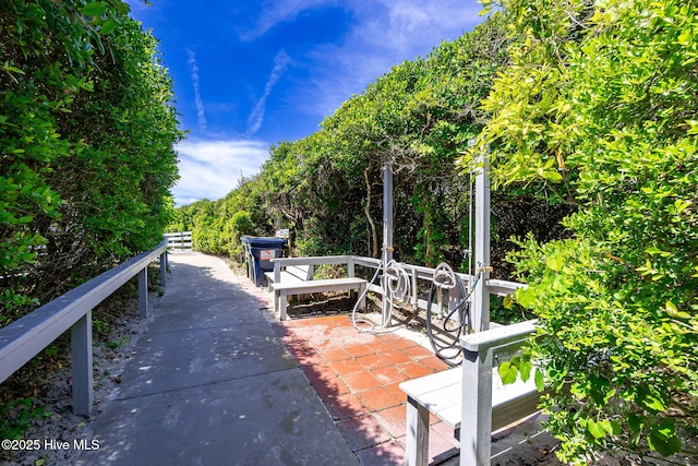 103 Arborvitae Ct, Pine Knoll Shores, NC 28512 - view of home's community with a patio area