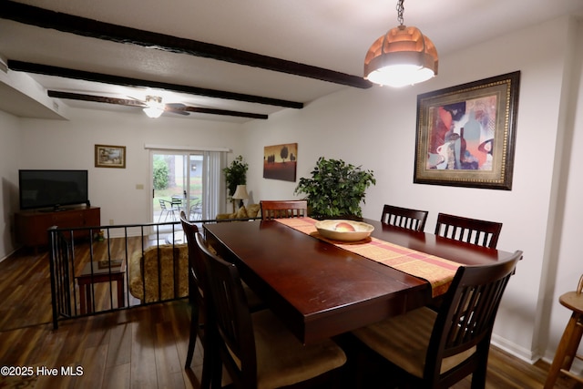 dining space featuring dark wood-style floors, beam ceiling, and baseboards