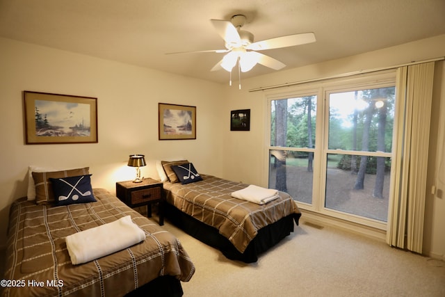 bedroom featuring carpet floors and ceiling fan