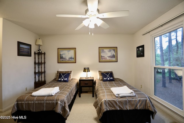 bedroom featuring carpet and a ceiling fan