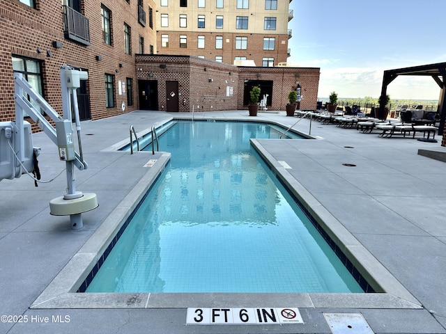 pool featuring a patio