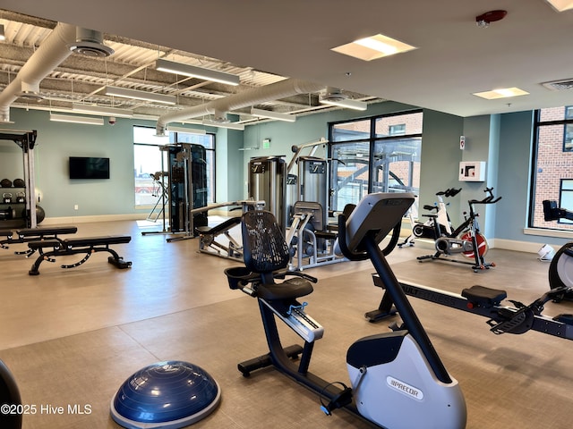 workout area featuring visible vents and baseboards