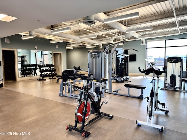 exercise room featuring visible vents