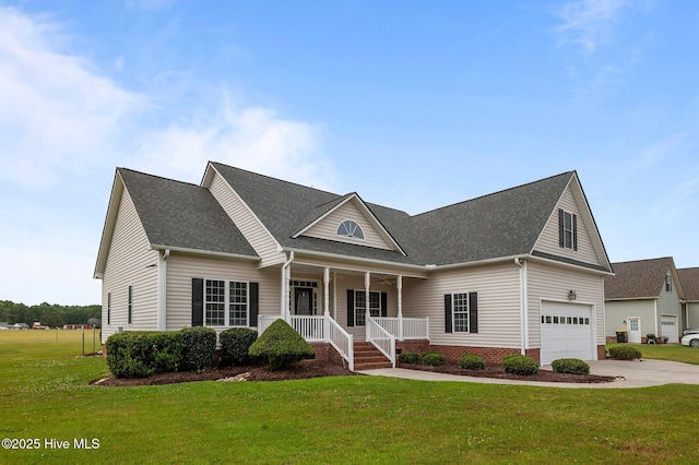 view of front of house featuring concrete driveway, a front yard, a shingled roof, and covered porch