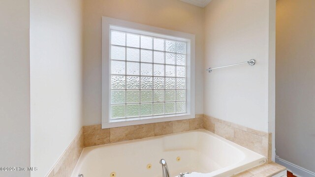 bathroom featuring a whirlpool tub