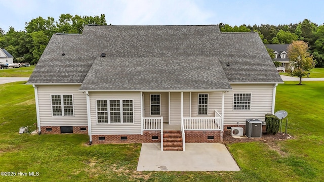 back of property featuring cooling unit, a yard, crawl space, a porch, and a patio area