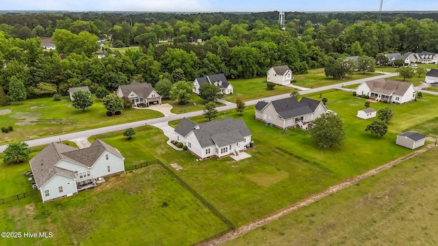 aerial view with a view of trees and a residential view