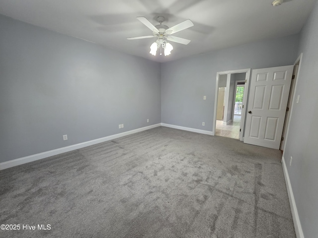 219 Drake Lndg, New Bern, NC 28560 - unfurnished room featuring baseboards, a ceiling fan, and carpet floors