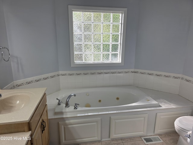 219 Drake Lndg, New Bern, NC 28560 - full bath with toilet, a jetted tub, tile patterned floors, visible vents, and vanity
