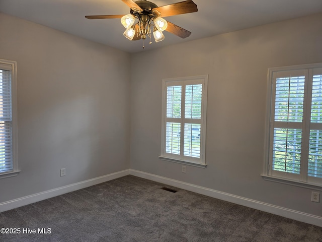 219 Drake Lndg, New Bern, NC 28560 - unfurnished room featuring baseboards, a ceiling fan, visible vents, and dark carpet