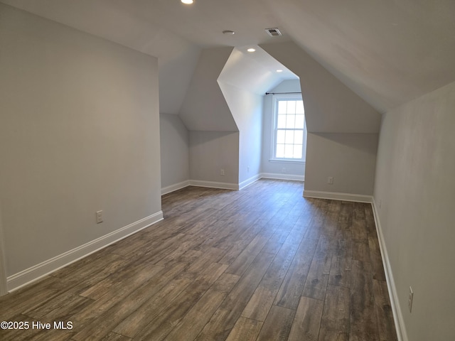 219 Drake Lndg, New Bern, NC 28560 - bonus room with lofted ceiling, recessed lighting, baseboards, dark wood-style flooring, and visible vents