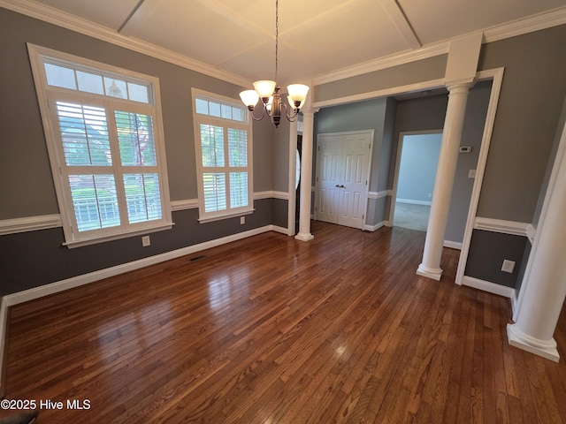 219 Drake Lndg, New Bern, NC 28560 - unfurnished dining area with a notable chandelier, baseboards, dark wood finished floors, decorative columns, and crown molding