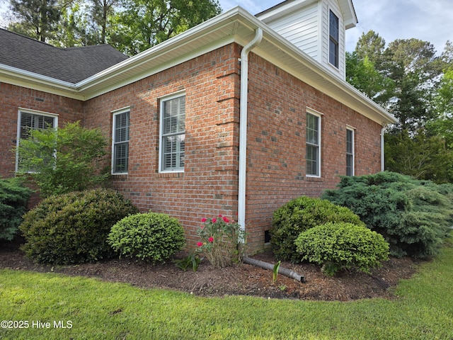 219 Drake Lndg, New Bern, NC 28560 - view of side of home featuring a shingled roof and brick siding