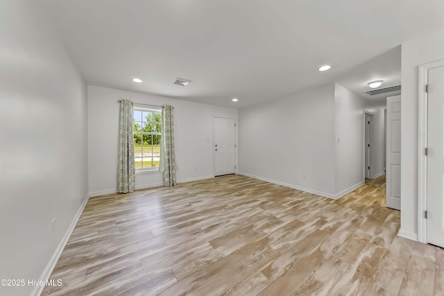 1406 Silverbrook Rd, Oriental, NC 28571 - spare room featuring light wood-style floors, recessed lighting, and baseboards