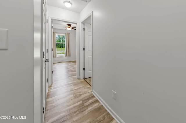 1406 Silverbrook Rd, Oriental, NC 28571 - hallway featuring light wood-type flooring and baseboards