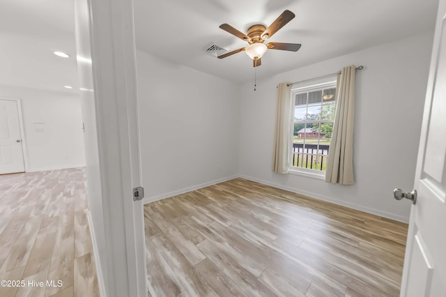 1406 Silverbrook Rd, Oriental, NC 28571 - empty room featuring a ceiling fan, light wood-type flooring, and baseboards