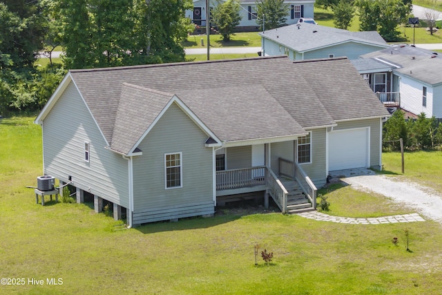 1406 Silverbrook Rd, Oriental, NC 28571 - view of front of home featuring covered porch, dirt driveway, a shingled roof, and a front yard