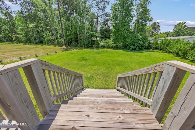 1406 Silverbrook Rd, Oriental, NC 28571 - wooden deck featuring a lawn