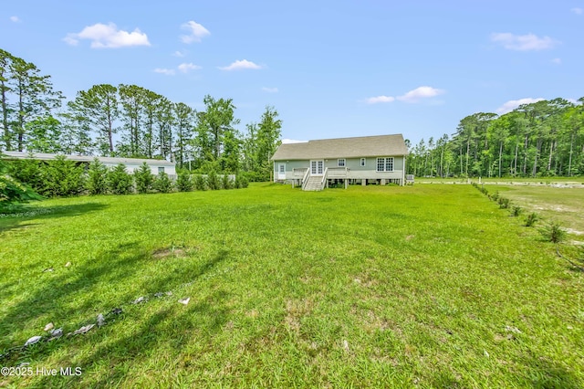 1406 Silverbrook Rd, Oriental, NC 28571 - view of grassy yard with a wooden deck