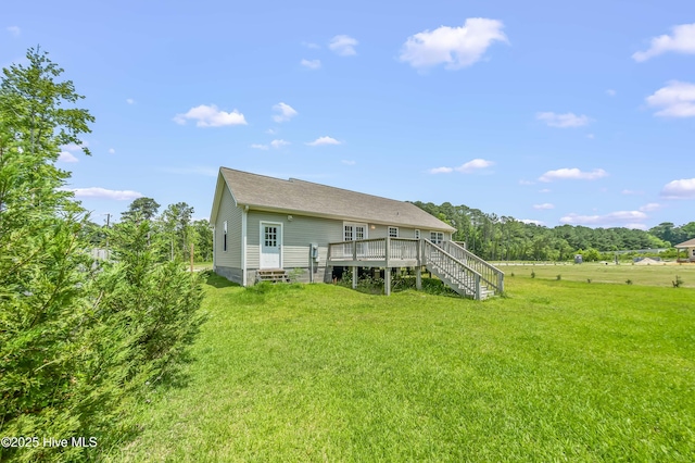 1406 Silverbrook Rd, Oriental, NC 28571 - rear view of house featuring a wooden deck, a yard, and stairs