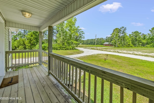 1406 Silverbrook Rd, Oriental, NC 28571 - porch with a yard and view of scattered trees