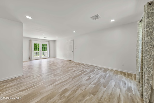 1406 Silverbrook Rd, Oriental, NC 28571 - unfurnished room featuring light wood finished floors, recessed lighting, and baseboards