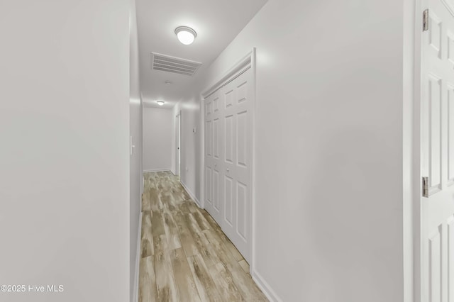 1406 Silverbrook Rd, Oriental, NC 28571 - corridor featuring light wood-style flooring and baseboards