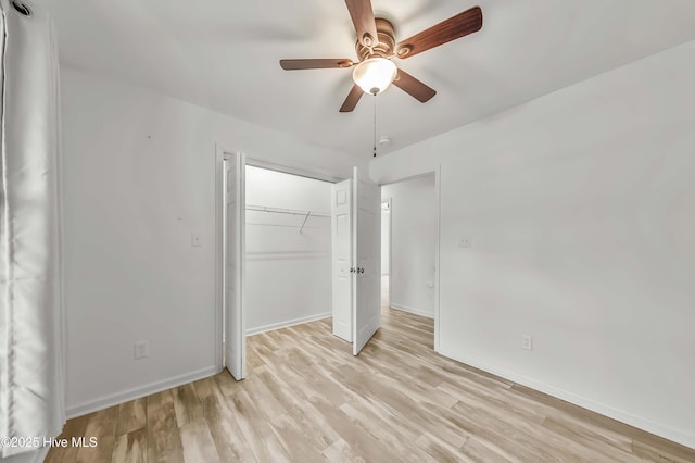 1406 Silverbrook Rd, Oriental, NC 28571 - unfurnished bedroom with light wood-style flooring, a closet, baseboards, and a ceiling fan