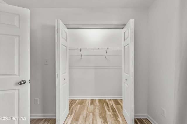 1406 Silverbrook Rd, Oriental, NC 28571 - walk in closet with light wood-type flooring