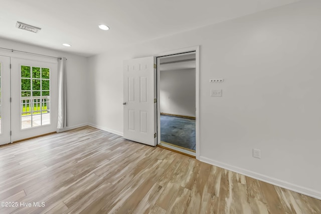 1406 Silverbrook Rd, Oriental, NC 28571 - empty room with baseboards, light wood-type flooring, and recessed lighting