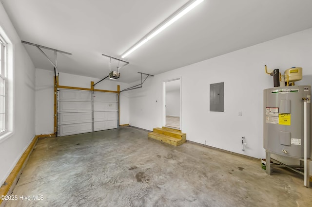 1406 Silverbrook Rd, Oriental, NC 28571 - garage with water heater, electric panel, a garage door opener, and baseboards