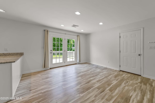 1406 Silverbrook Rd, Oriental, NC 28571 - unfurnished living room featuring light wood-style floors, recessed lighting, and baseboards