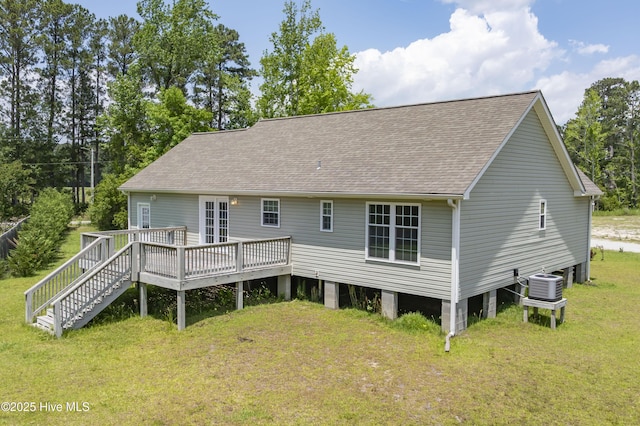 1406 Silverbrook Rd, Oriental, NC 28571 - back of house with a shingled roof, central AC unit, a wooden deck, and a yard