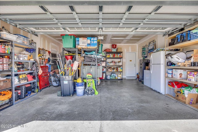 garage featuring freestanding refrigerator
