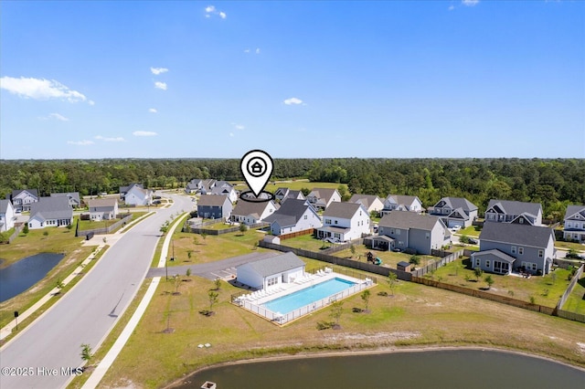 aerial view with a water view and a residential view