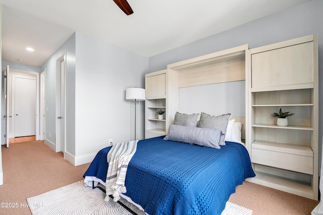 bedroom featuring light colored carpet, baseboards, ceiling fan, and recessed lighting