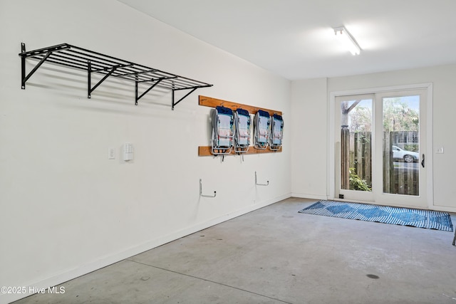 garage featuring baseboards