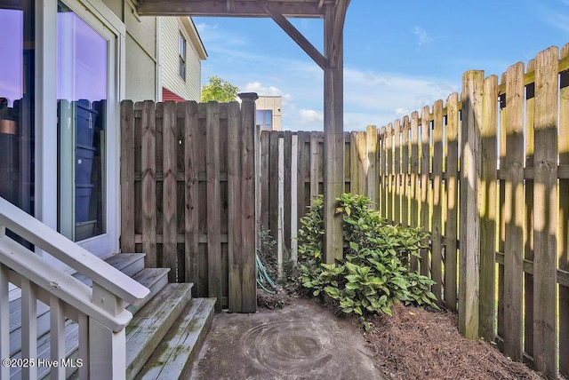 view of patio with fence