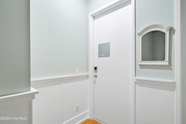doorway featuring wood finished floors