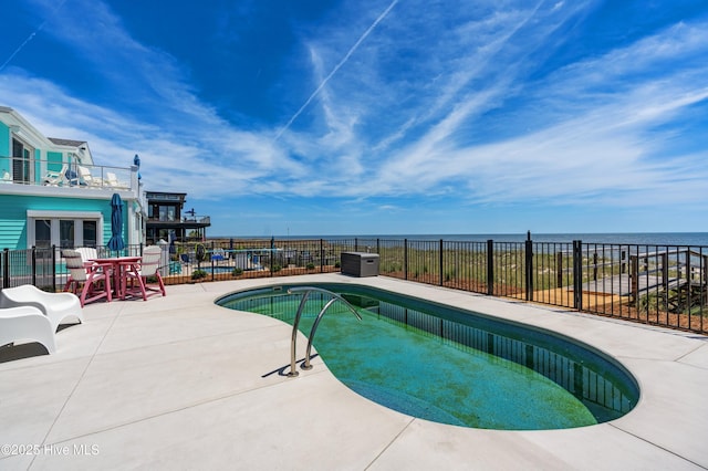826 Fort Fisher Blvd N, Kure Beach, NC 28449 - view of pool with a swimming pool, a patio area, and a water view