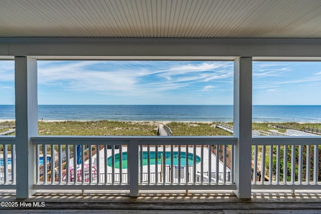826 Fort Fisher Blvd N, Kure Beach, NC 28449 - wooden terrace featuring view of water and beach