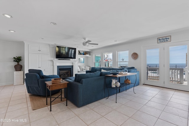 826 Fort Fisher Blvd N, Kure Beach, NC 28449 - living room featuring ceiling fan, light tile patterned flooring, recessed lighting, and a fireplace