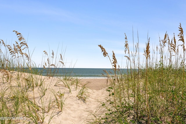 property view of water with a beach view