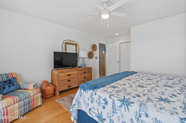 826 Fort Fisher Blvd N, Kure Beach, NC 28449 - bedroom with light wood-style floors, a closet, a ceiling fan, and recessed lighting