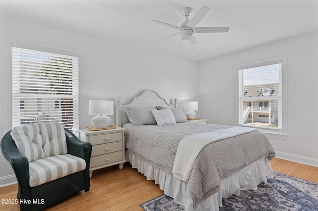 826 Fort Fisher Blvd N, Kure Beach, NC 28449 - bedroom with light wood-type flooring, baseboards, and ceiling fan