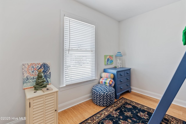 826 Fort Fisher Blvd N, Kure Beach, NC 28449 - bedroom featuring light wood-type flooring and baseboards
