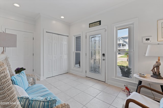 826 Fort Fisher Blvd N, Kure Beach, NC 28449 - entrance foyer featuring light tile patterned floors, ornamental molding, baseboards, and recessed lighting