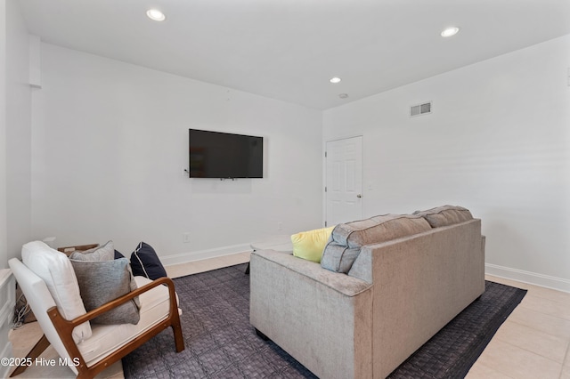 826 Fort Fisher Blvd N, Kure Beach, NC 28449 - tiled living room featuring recessed lighting and baseboards