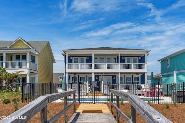 826 Fort Fisher Blvd N, Kure Beach, NC 28449 - view of front facade with a balcony